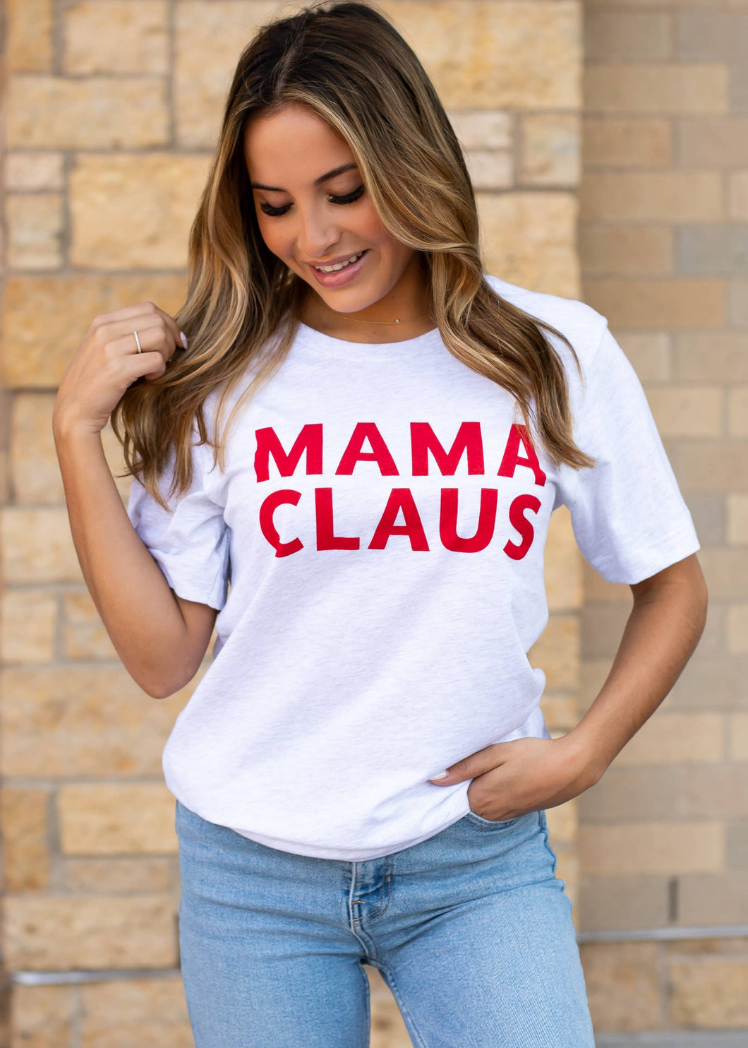 MAMA CLAUS written in red ink on light grey tee